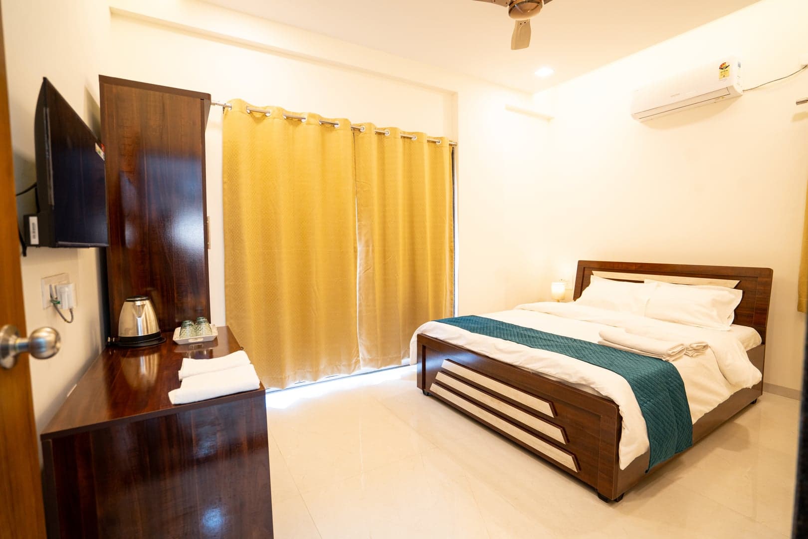 A Deluxe room at 46 Elite Enclave, Nashik